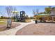 Community park featuring a playground, covered picnic area, and walking paths, offering a Gathering-friendly environment at 85 W Grey Stone St, San Tan Valley, AZ 85143