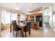 Bright eat-in kitchen featuring stainless steel appliances, granite countertops, and tile flooring at 85 W Grey Stone St, San Tan Valley, AZ 85143