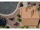 Aerial view features mature landscaping and well maintained rock beds at 9130 W Rimrock Dr, Peoria, AZ 85382