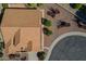 Stunning aerial view of a meticulously landscaped property with a terra-cotta tiled roof and desert landscaping at 9130 W Rimrock Dr, Peoria, AZ 85382