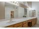 The primary bathroom offers double sinks, marble countertops, and great storage at 9130 W Rimrock Dr, Peoria, AZ 85382