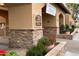 Charming recreation center with stone accents, flower-filled planters, and a welcoming entrance at 9130 W Rimrock Dr, Peoria, AZ 85382