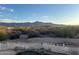 Scenic property view with pool, desert landscaping, and mountain view at 9736 E Sleepy Hollow Trl, Gold Canyon, AZ 85118