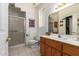 Bathroom features vanity, toilet, and shower with glass doors at 9736 E Sleepy Hollow Trl, Gold Canyon, AZ 85118