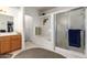 Inviting bathroom showcasing tub with shower, vanity, and a neutral color palette at 9736 E Sleepy Hollow Trl, Gold Canyon, AZ 85118