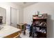 Bathroom with storage shelves, sink with cabinet, and toilet, needing a clean at 9736 E Sleepy Hollow Trl, Gold Canyon, AZ 85118