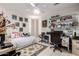Cozy room with daybed, desk, and shelving, perfect as a bedroom or home office space at 9736 E Sleepy Hollow Trl, Gold Canyon, AZ 85118