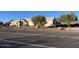 Street view of home with desert landscaping, cacti, and mountain views at 9736 E Sleepy Hollow Trl, Gold Canyon, AZ 85118