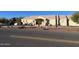 Street view of Southwestern-style home with desert landscaping and cactus at 9736 E Sleepy Hollow Trl, Gold Canyon, AZ 85118