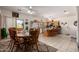 Spacious kitchen and dining area featuring wooden cabinets, an island, and an eating area at 9736 E Sleepy Hollow Trl, Gold Canyon, AZ 85118