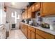 Functional kitchen with wooden cabinets, ample counter space, and modern appliances at 9736 E Sleepy Hollow Trl, Gold Canyon, AZ 85118