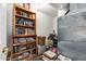 Office space featuring a bookshelf, desk, and vintage decor at 9736 E Sleepy Hollow Trl, Gold Canyon, AZ 85118