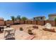 Spacious backyard with patio area and potential for landscaping and outdoor living at 10037 W Watkins St, Tolleson, AZ 85353