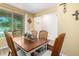 Bright dining area with a modern table set near a sunny window at 10037 W Watkins St, Tolleson, AZ 85353