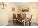 Cozy dining area featuring a classic table set and warm, neutral decor at 10037 W Watkins St, Tolleson, AZ 85353