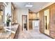 This bathroom features double sinks, granite countertops, a walk-in shower, and a closet at 10067 E Santa Catalina Dr, Scottsdale, AZ 85255