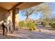 A lovely seating area outside with desert scenery, offering a relaxing and picturesque outdoor experience at 10067 E Santa Catalina Dr, Scottsdale, AZ 85255