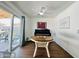 Bright dining area with sliding glass doors, a ceiling fan, and neutral walls at 10563 E Bramble Ave, Mesa, AZ 85208