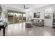 Cozy living room with sliding glass doors to the backyard and neutral-toned furnishings at 1211 E Jahns Dr, Casa Grande, AZ 85122