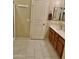 Bathroom with vanity, tile floors, and framed mirror, providing a simple design at 1225 N 36Th St # 1054, Phoenix, AZ 85008