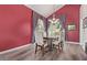 Charming dining room with a wooden table, floral chairs, and ample natural light at 1333 E Rockledge Rd, Phoenix, AZ 85048