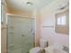 Bathroom featuring shower with glass doors, sink, and neutral walls at 13425 N 16Th Ave, Phoenix, AZ 85029