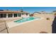 Inviting backyard featuring a sparkling pool and low maintenance desert landscaping at 13425 N 16Th Ave, Phoenix, AZ 85029