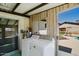 Sun room with Washer/Dryer and view of back yard and pool at 13425 N 16Th Ave, Phoenix, AZ 85029