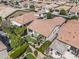 Aerial view of a home showcasing a private backyard, covered patio, and desert landscaping at 1357 E Elysian Pass, Queen Creek, AZ 85140