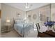 Serene bedroom featuring a metal bed frame, soft colors, and natural lighting at 1357 E Elysian Pass, Queen Creek, AZ 85140