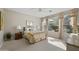 Comfortable main bedroom with natural light, neutral tones, and bedside tables at 1357 E Elysian Pass, Queen Creek, AZ 85140