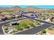 Beautiful aerial shot of a home in a well-planned community offering mountain views and an attractive layout at 16788 W Beth Dr, Goodyear, AZ 85338