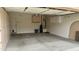 Well-organized garage featuring built-in cabinets, providing ample storage space and easy access to utilities and entry door at 18430 E Azul Ct, Gold Canyon, AZ 85118