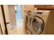 Modern laundry room with front-load washer and dryer at 18430 E Azul Ct, Gold Canyon, AZ 85118