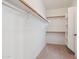 Spacious walk-in closet featuring ample shelving and storage options at 18430 E Azul Ct, Gold Canyon, AZ 85118