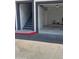 This home includes a two-car garage with an entrance to interior stairs at 20 S Buena Vista Ave # 207, Gilbert, AZ 85296