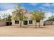 Picture of the rear of a house, backyard featuring a sliding glass door at 2023 S 106Th Ave, Tolleson, AZ 85353