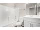 Fresh bathroom with white fixtures, a tub-shower combo, and sleek vanity, providing a clean aesthetic at 2023 S 106Th Ave, Tolleson, AZ 85353