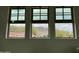 A view from inside showing a mountain landscape framed by the home's windows at 20701 W Minnezona Ave, Buckeye, AZ 85396