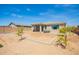 Spacious backyard with fresh landscaping and patio at 21295 E Estrella Rd, Queen Creek, AZ 85142