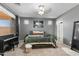 Comfortable bedroom featuring soft carpet, soothing paint, and an abundance of natural light at 2340 S 238Th Ln, Buckeye, AZ 85326