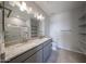 Bathroom featuring a double vanity with granite countertop and tiled floors at 2570 E Music Mountain Ave, Apache Junction, AZ 85119
