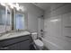 A modern bathroom with granite vanity, and shower-tub combo at 2570 E Music Mountain Ave, Apache Junction, AZ 85119