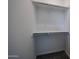 A walk-in closet with white walls, carpet and metal rods at 2570 E Music Mountain Ave, Apache Junction, AZ 85119