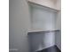 A walk-in closet with white walls, carpet and metal rods at 2570 E Music Mountain Ave, Apache Junction, AZ 85119