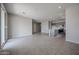 Expansive open-concept living area seamlessly connects the living, dining, and kitchen spaces at 2570 E Music Mountain Ave, Apache Junction, AZ 85119