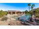 Inviting pool and spa combo with a covered patio in the backyard at 2890 N 156Th Dr, Goodyear, AZ 85395