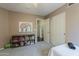 Cozy bedroom with a bookshelf, large closet, and neutral paint at 3116 W Folgers Rd, Phoenix, AZ 85027