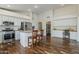 Bright, open kitchen with stainless steel appliances, a butcher block island, and hardwood floors at 3116 W Folgers Rd, Phoenix, AZ 85027