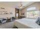 Comfortable main bedroom with vaulted ceiling, natural light, and sitting area at 3116 W Folgers Rd, Phoenix, AZ 85027